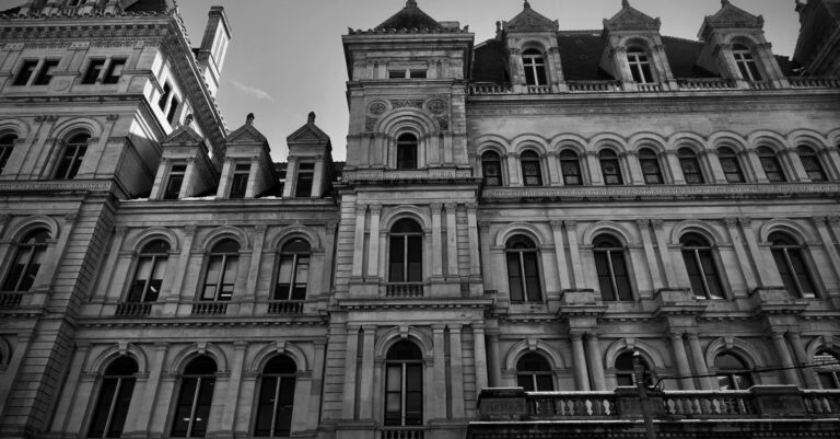 Black and white photo of the iconic New York State Capitol, Albany's architectural landmark.